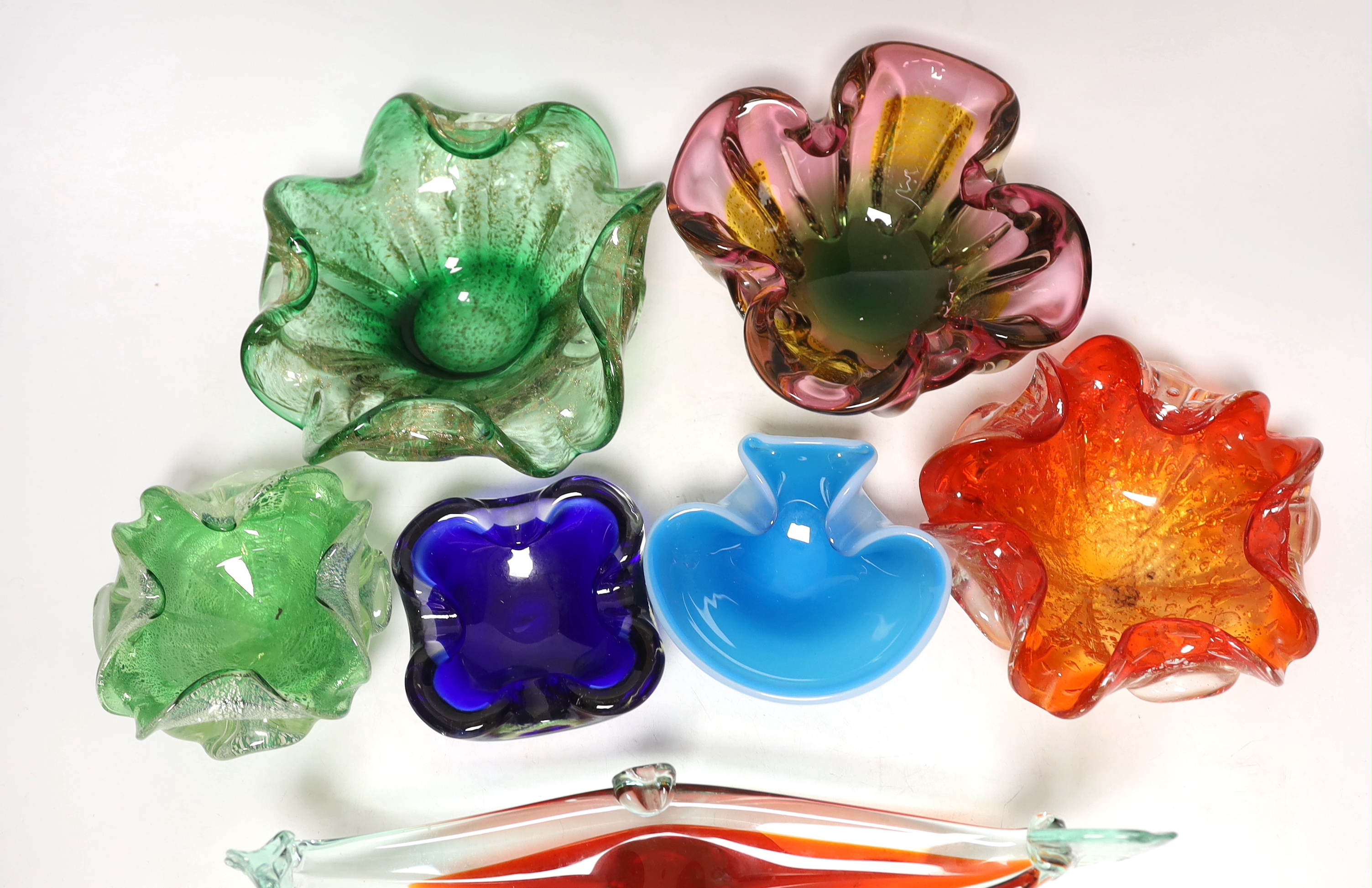 Seven Murano glass small bowls, one in the form of a long boat, 33.5cm long